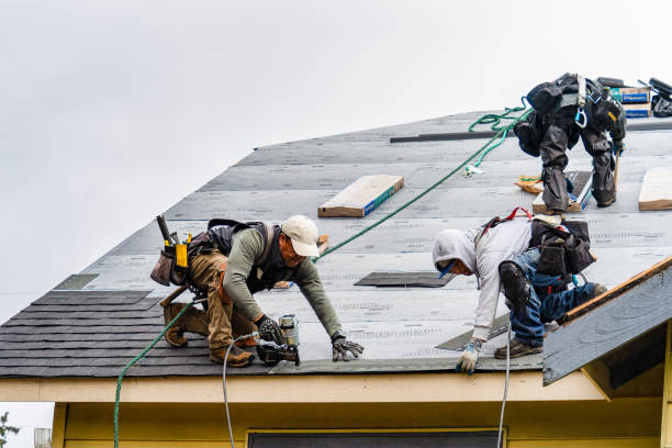 Professional Gutter Installation technician working in Alverton, PA